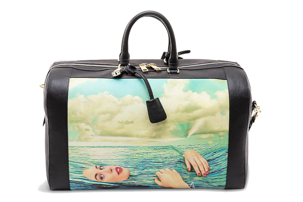 Carry-on with art print on the front