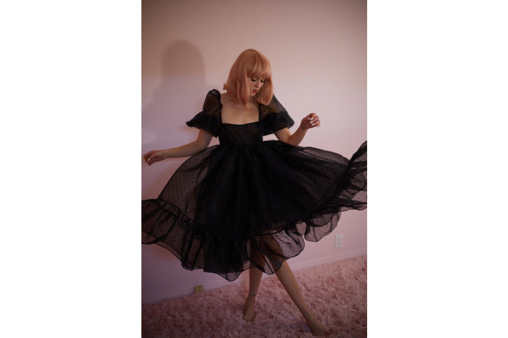 Woman in black mini dress