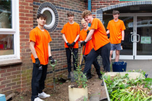 Pupils planting outside