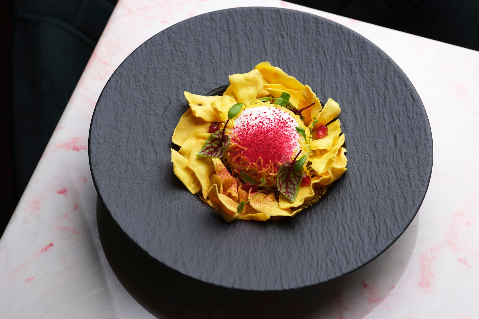 Burrata chaat in a slate bowl