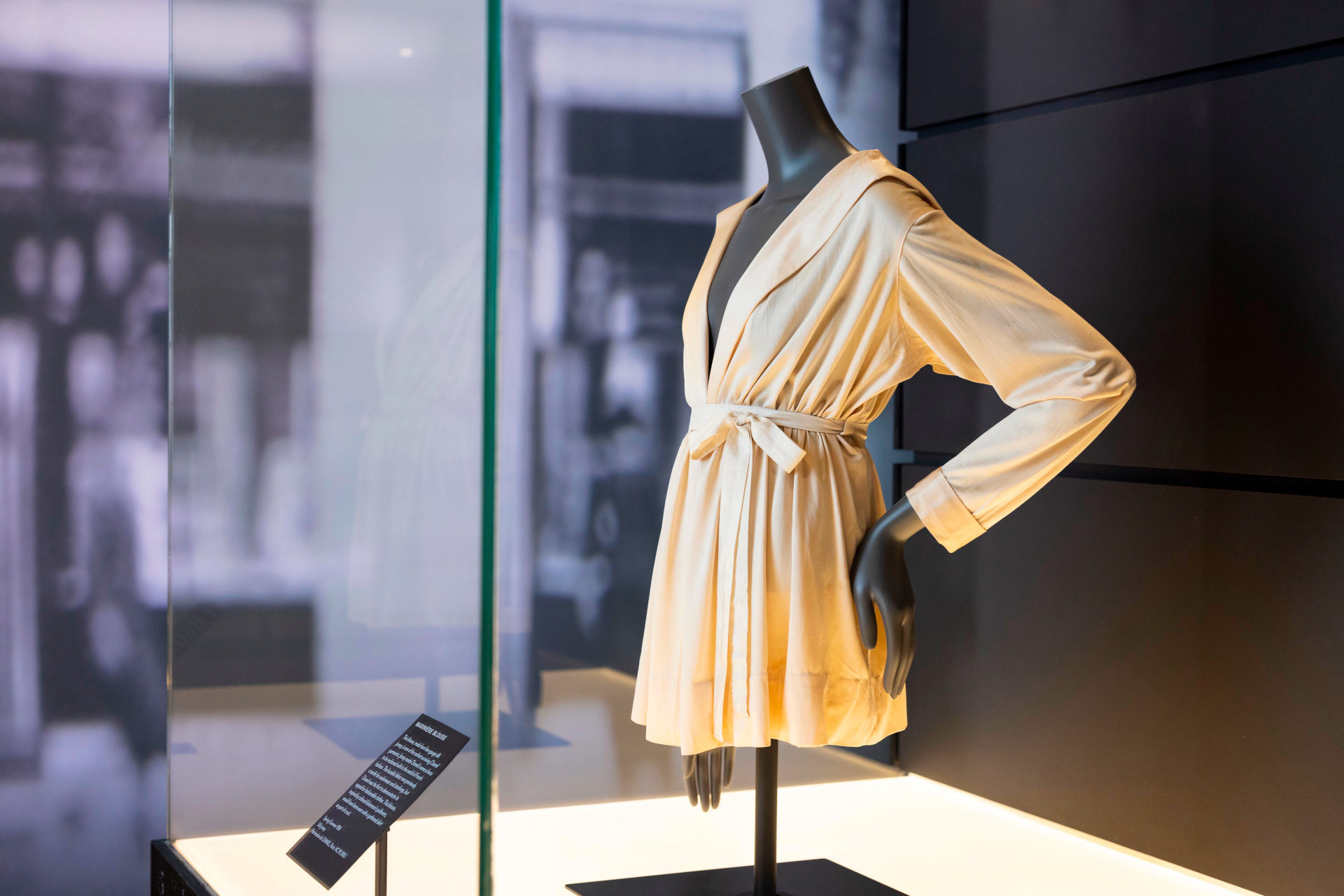 Blouse on mannequin in display case