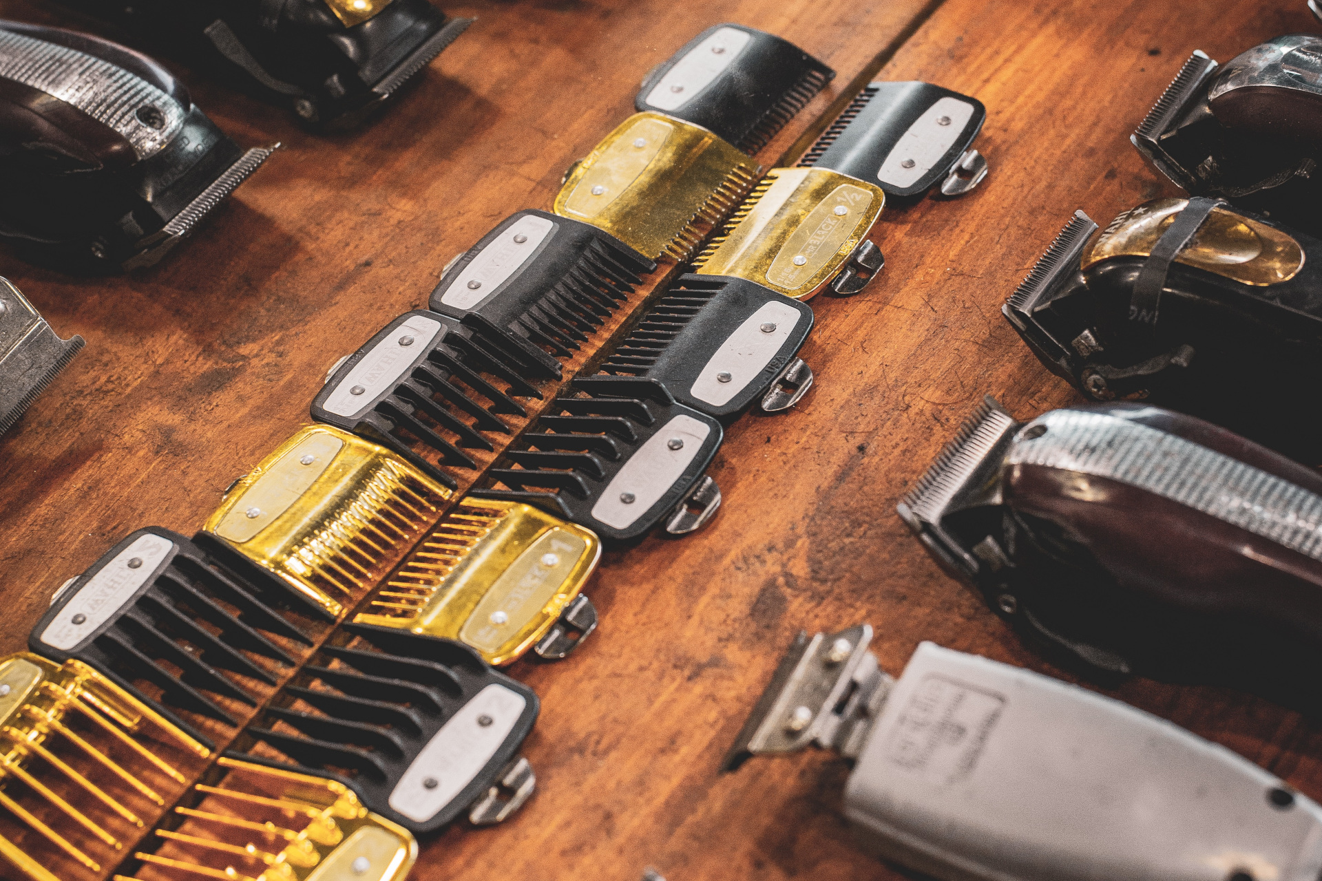 Hair clippers lined up with guards