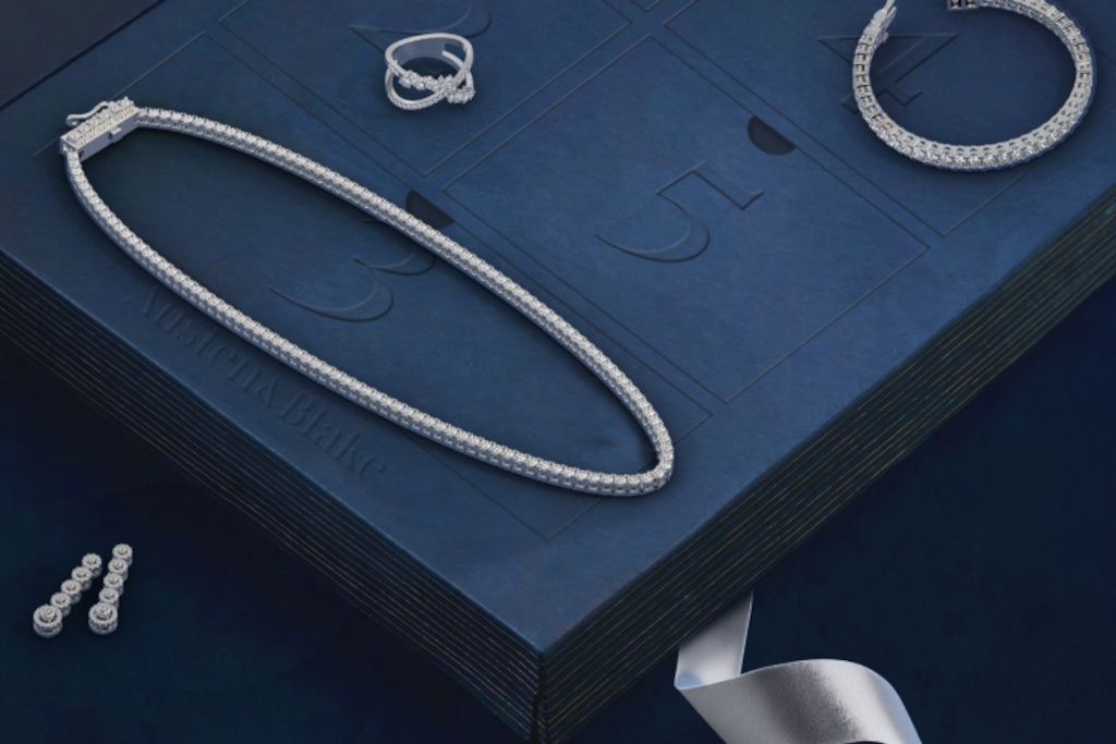 Close up of silver jewellery on blue box