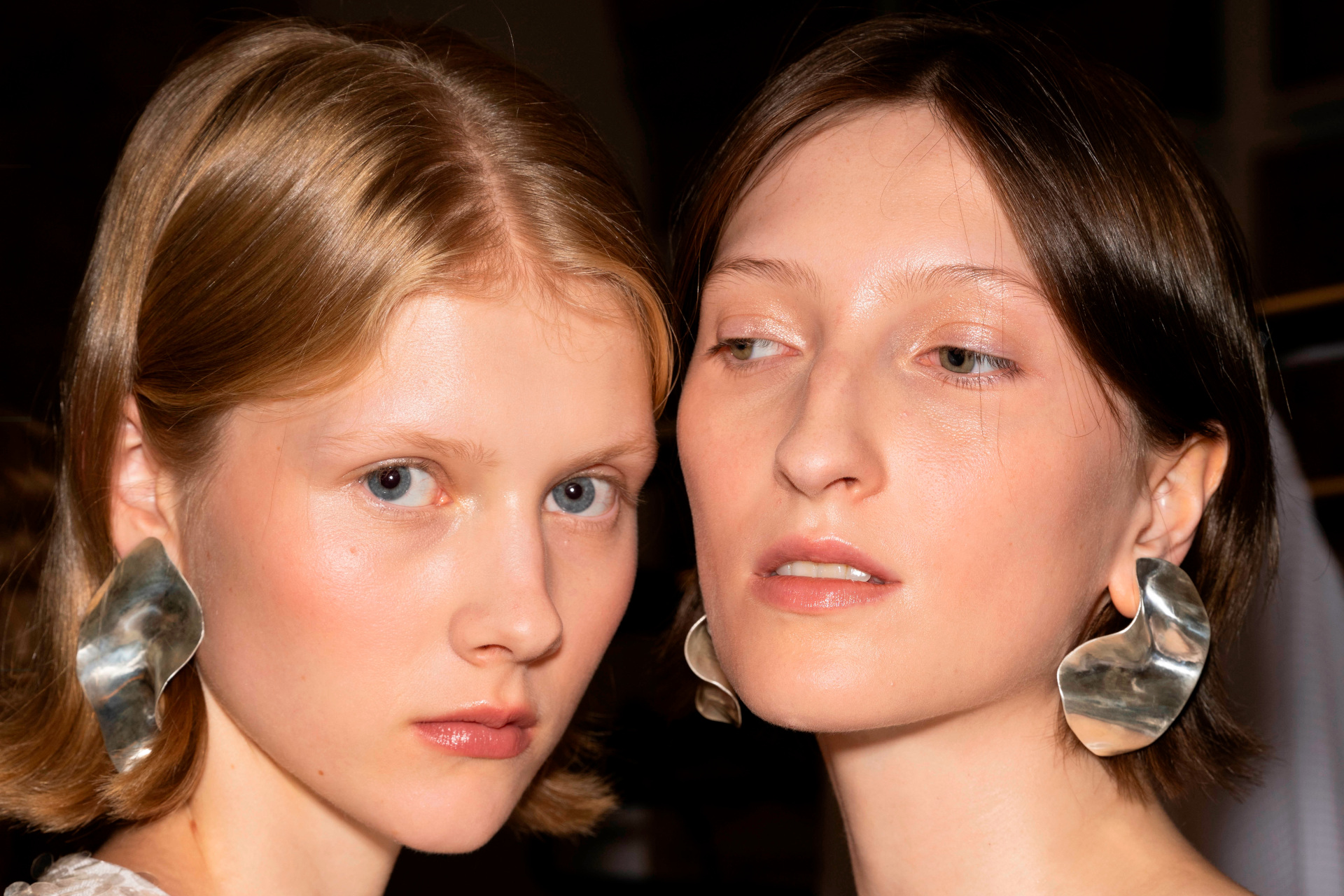 Close up of women's faces with hydro bob hairstyles