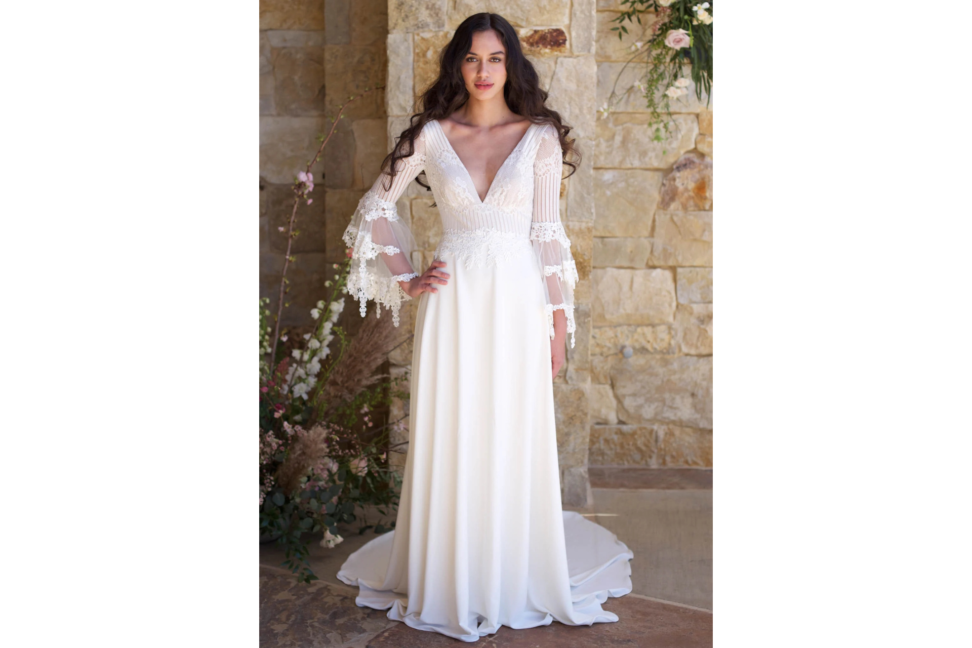 Woman in long sleeve gown