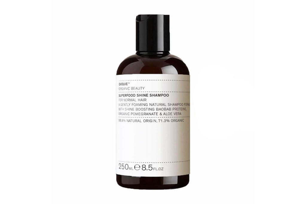 Black shampoo bottle with white label