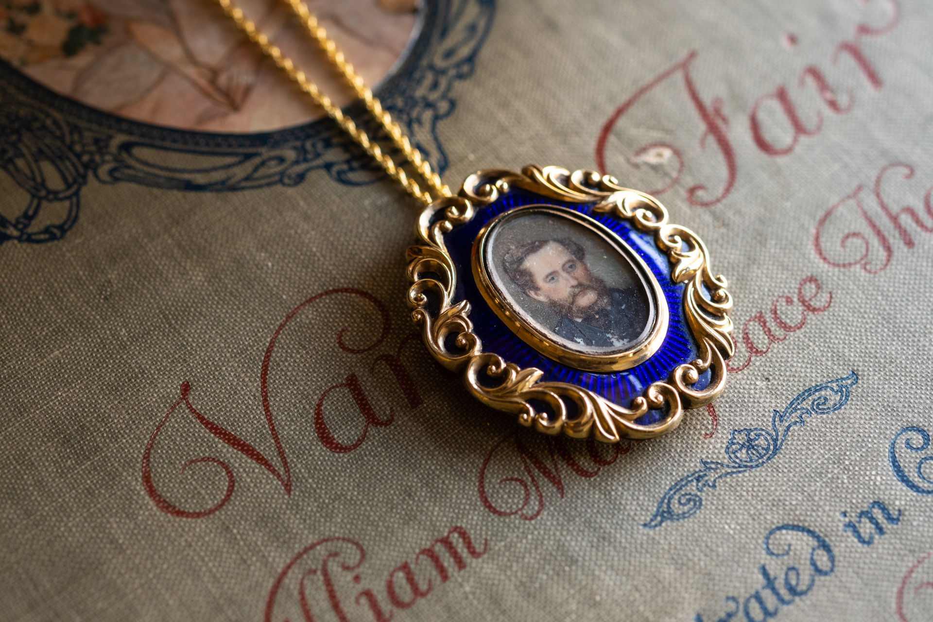 Close up of painted portrait locket