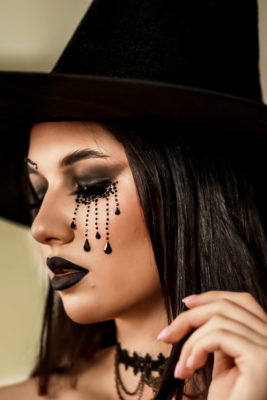 Woman in witch Halloween makeup