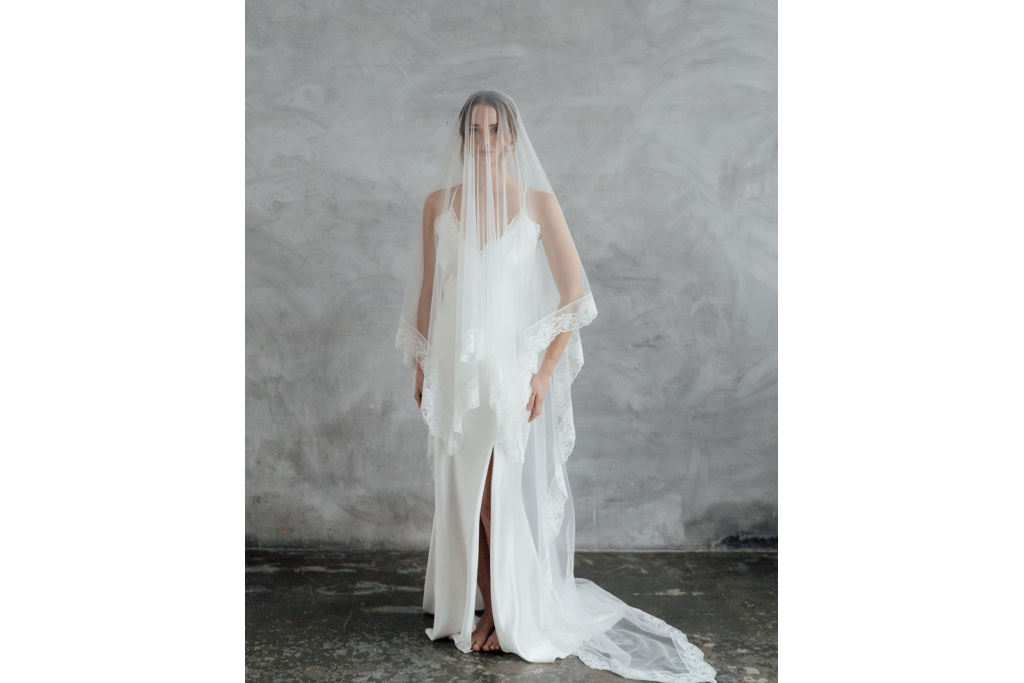Woman in white dress and veil | boho wedding dresses