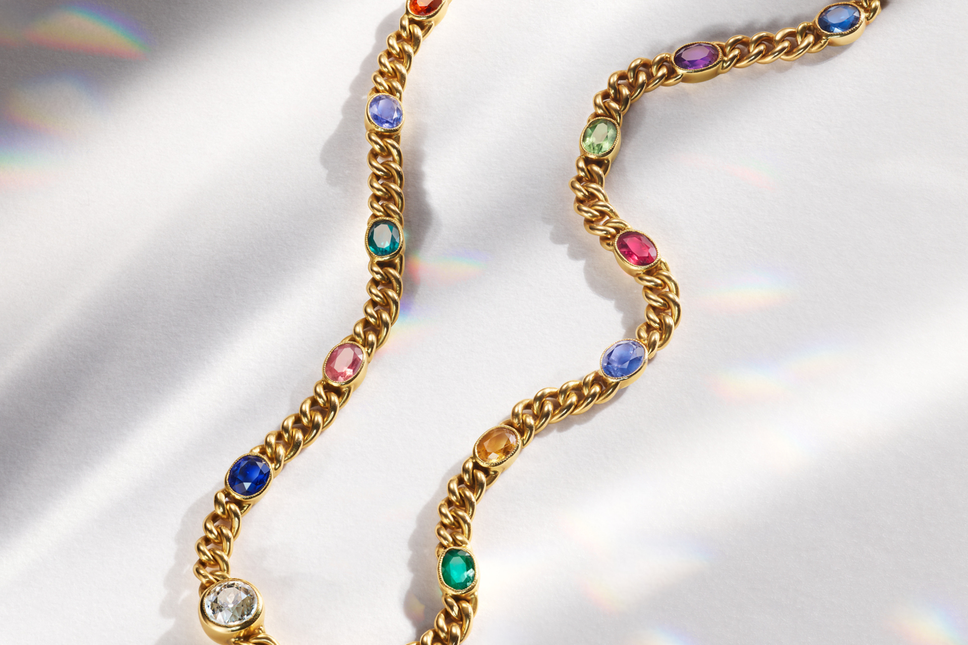 Gold chain with rainbow gems
