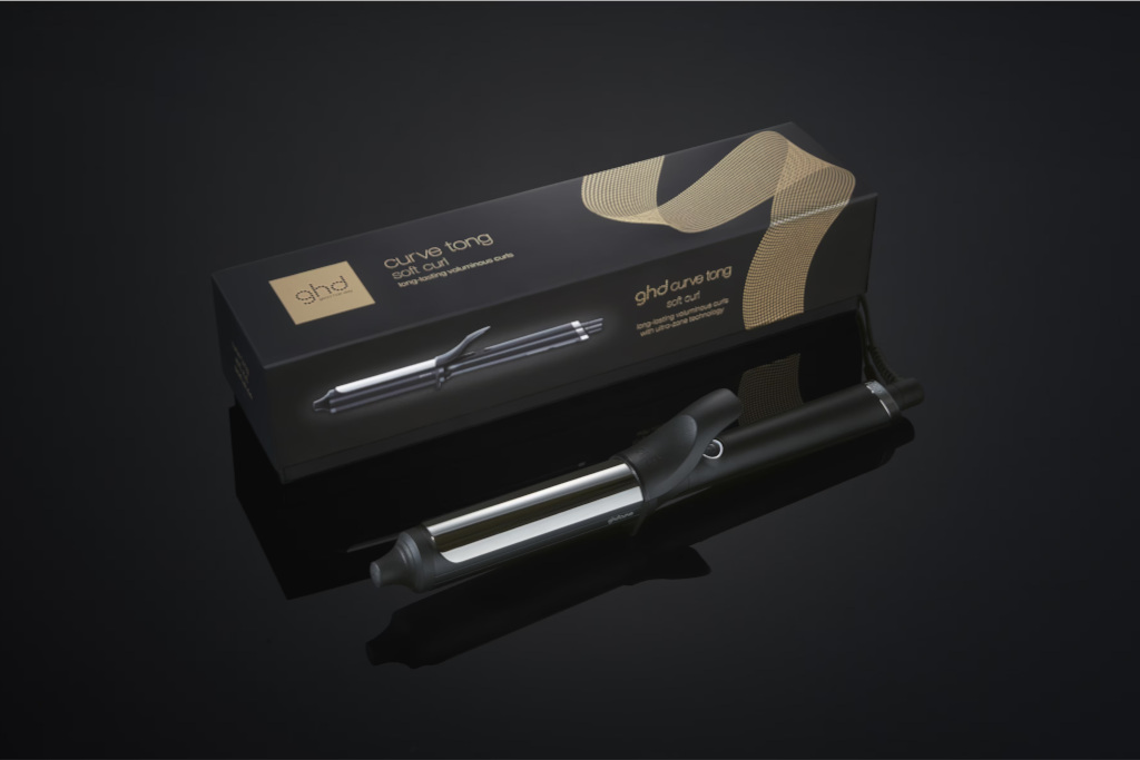 Hiar curler next to matching box
