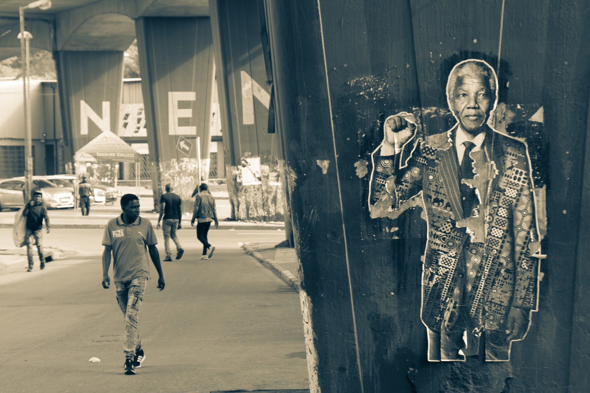 Street scene in Johannesburg with Nelson Mandela poster