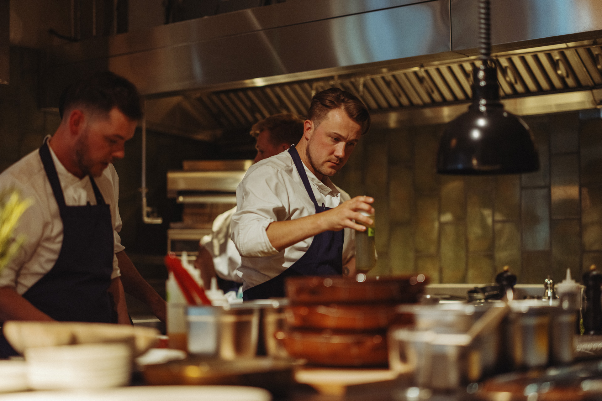 A chef cooking in a restaurant kitchen