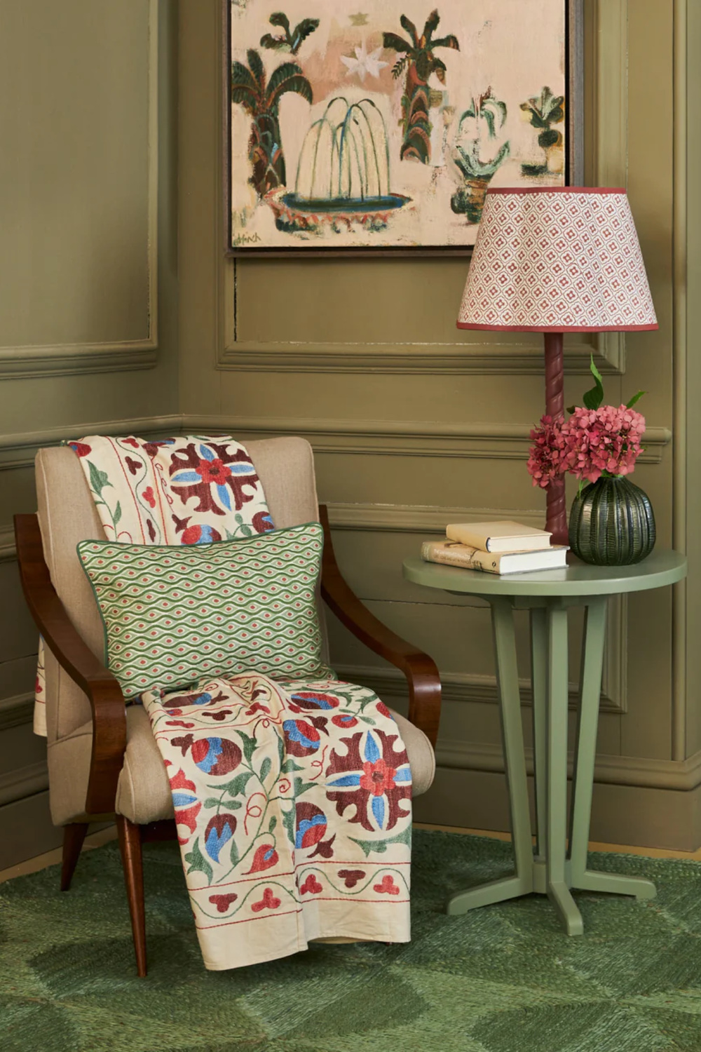 Chair with side table and scalloped lampshade
