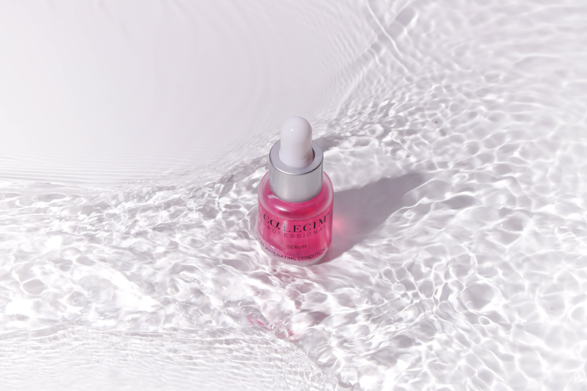 Pink beauty serum bottle