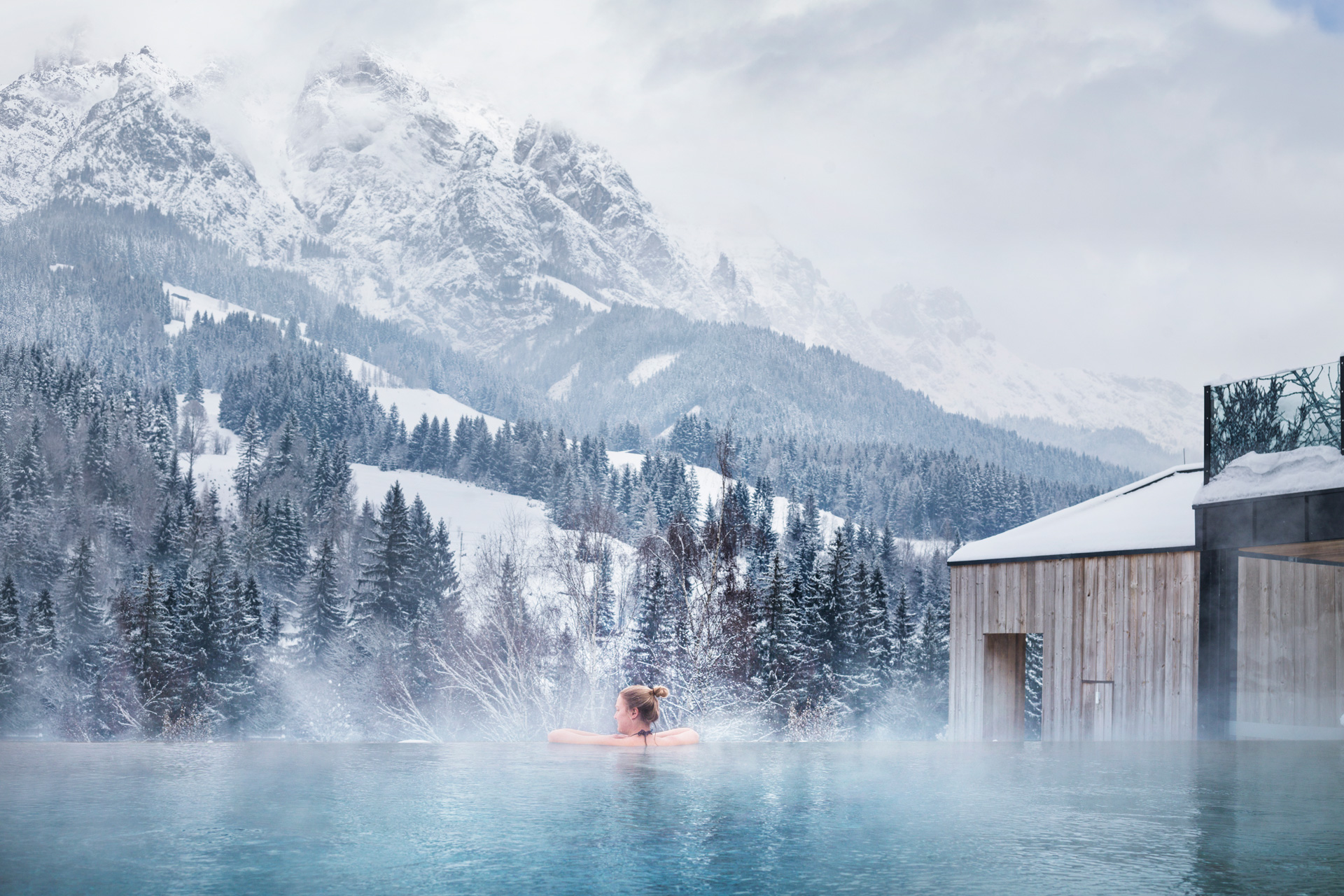 Heated alpine spa overlooking the mountains