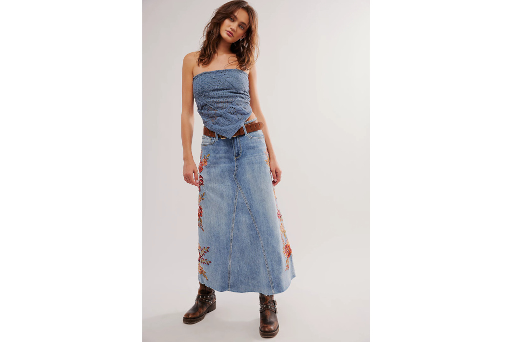 Woman in blue top and maxi skirt