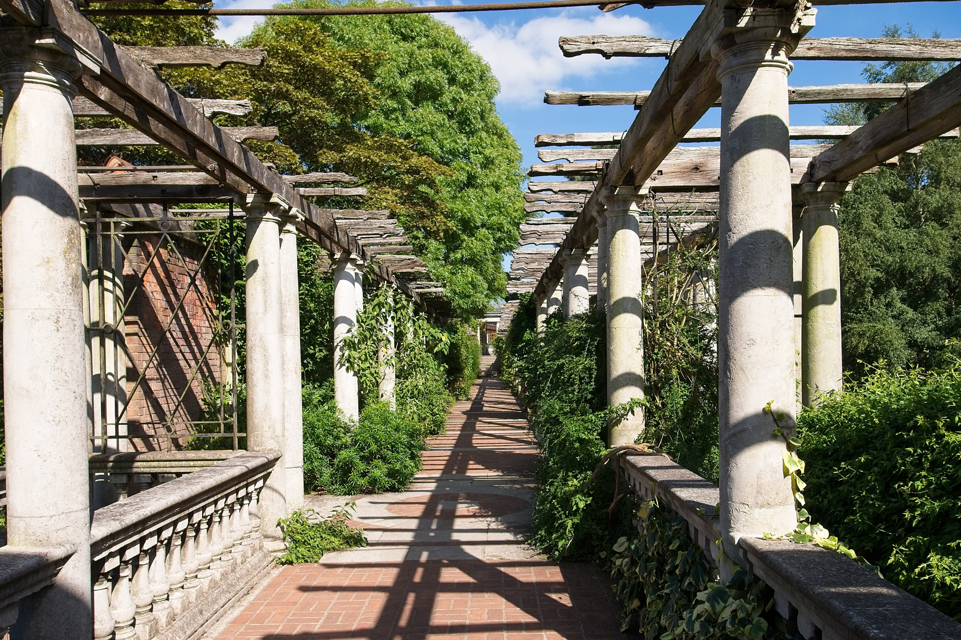 Hampstead Pergola, a raised walkway, overgrown with vines in London