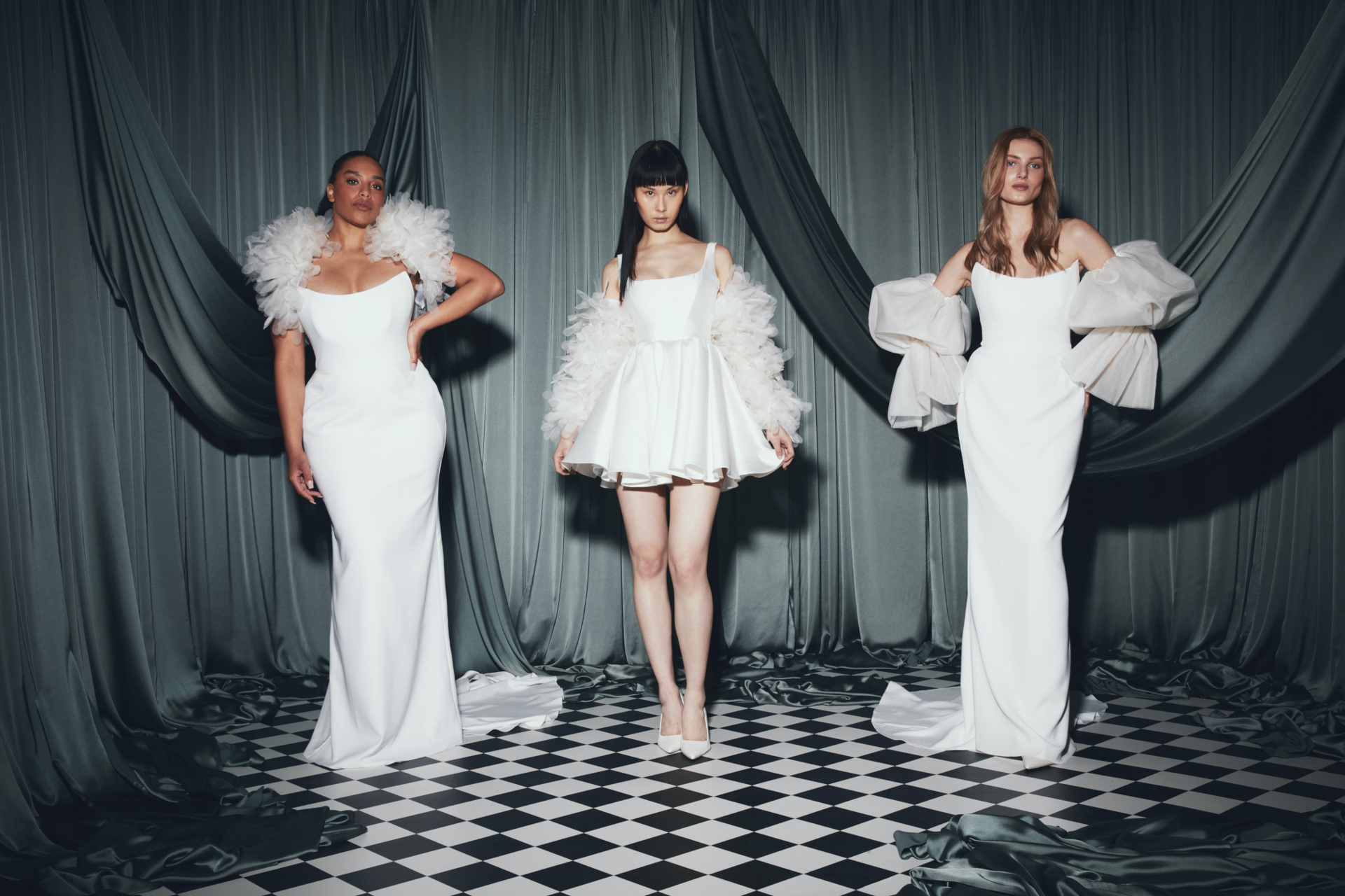 Three women in wedding dresses