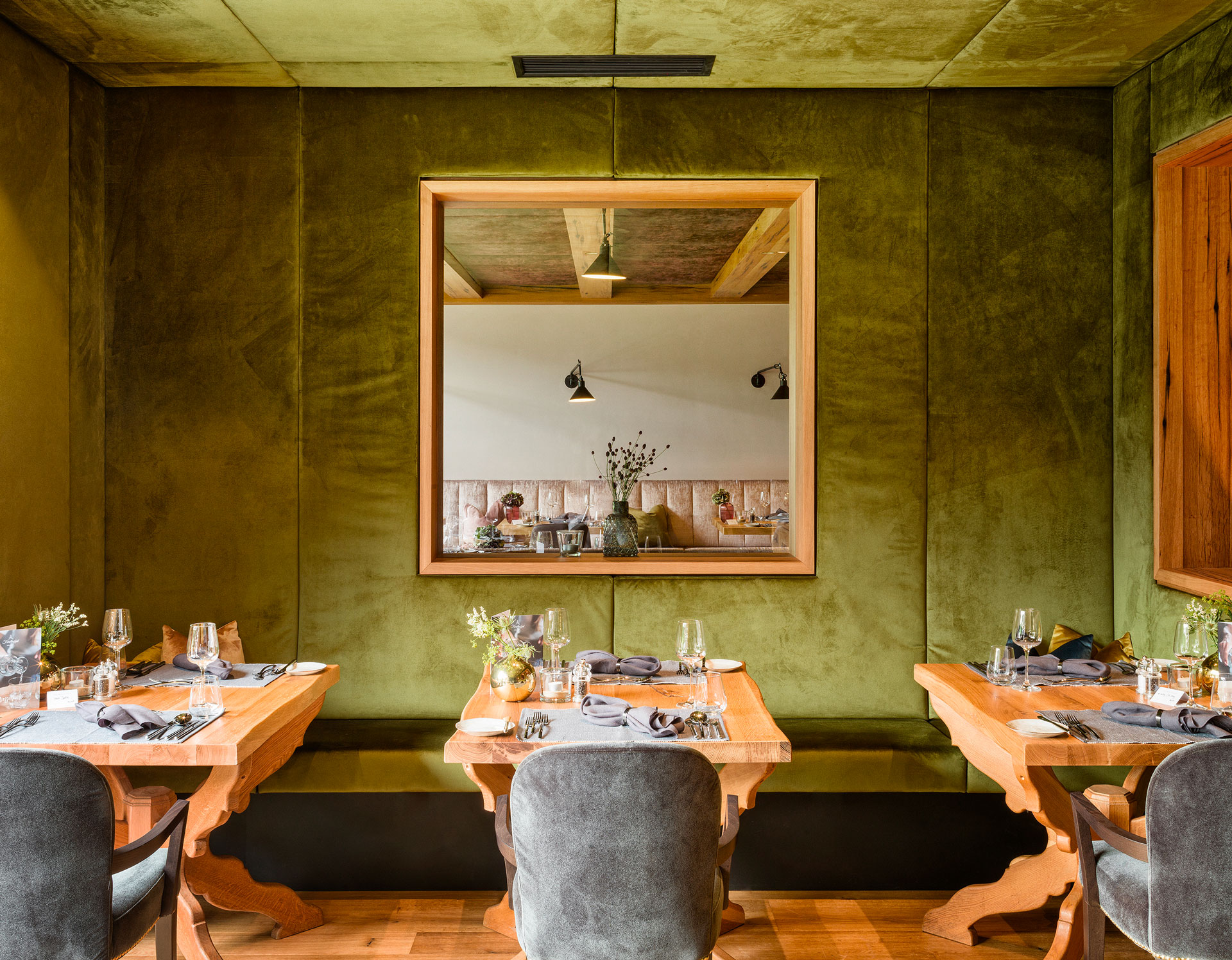 A green-walled hotel restaurant