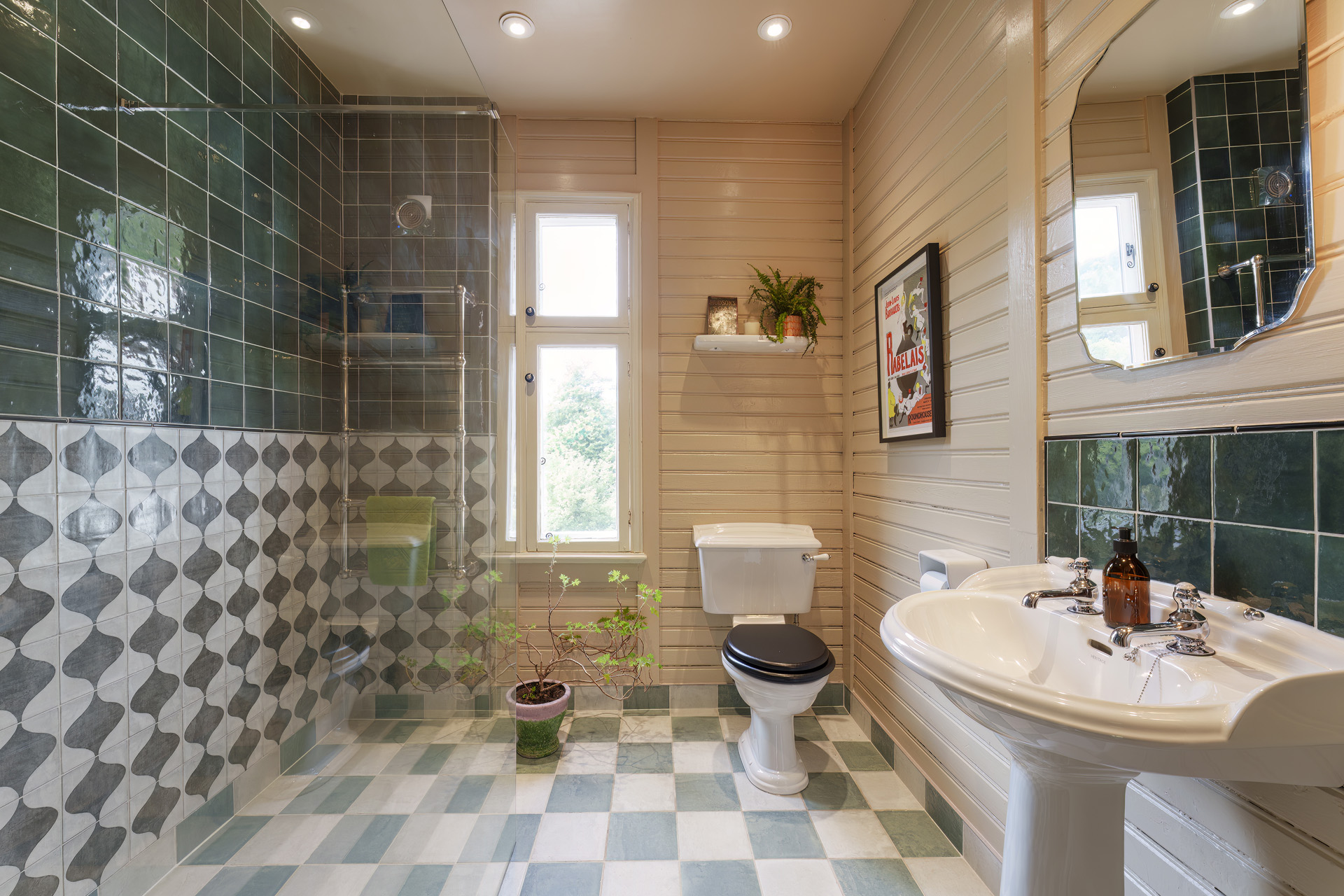 A bedroom with white and blue floor tiles