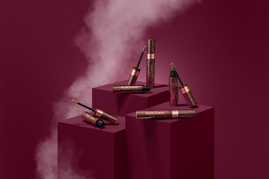 Mascaras in burgundy background
