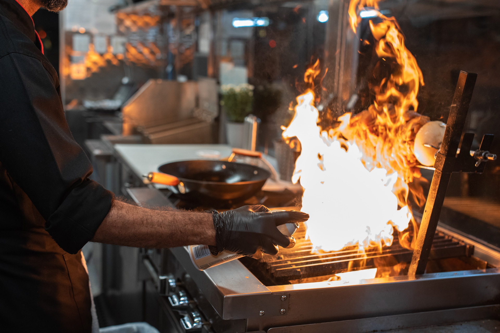 Chef cooking on open fire