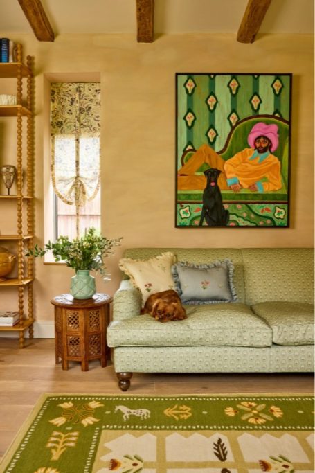 Dog on sofa in colourful room | British textile designers