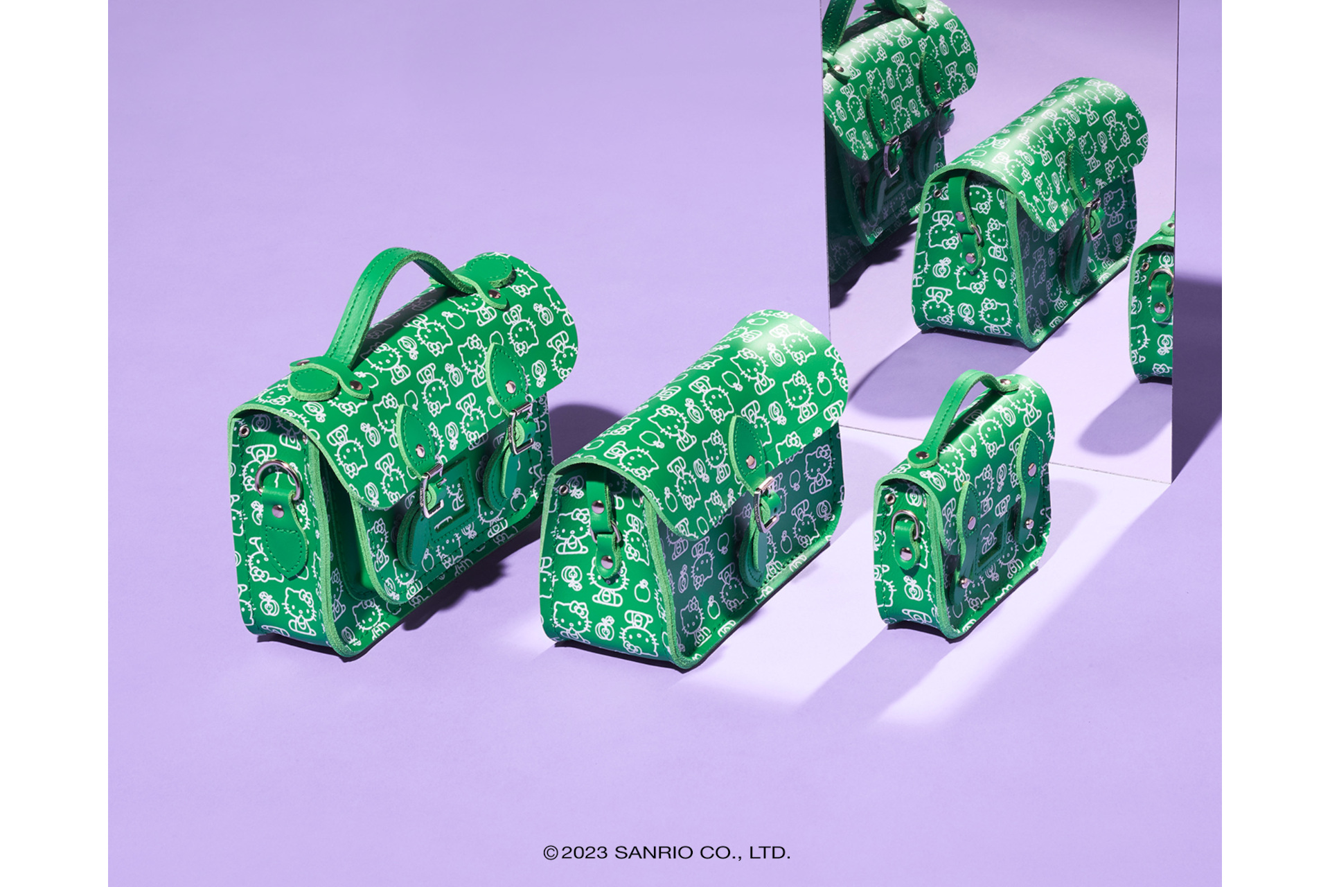 Green bags on purple background