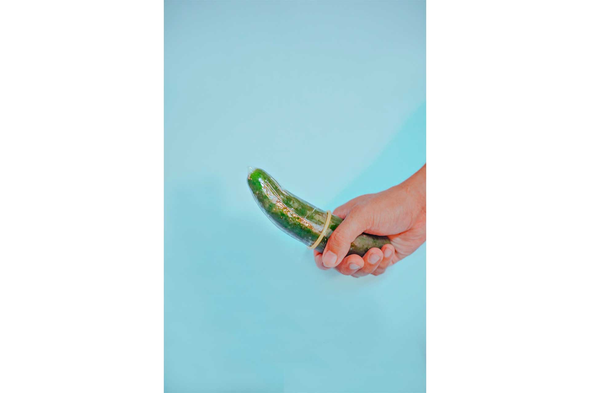 Condom on a cucumber