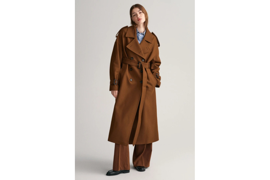 Woman in brown trench coat