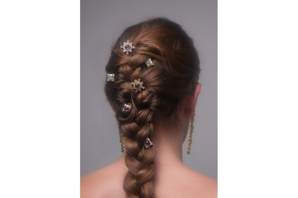 Close up of hairstyle with glittery pins