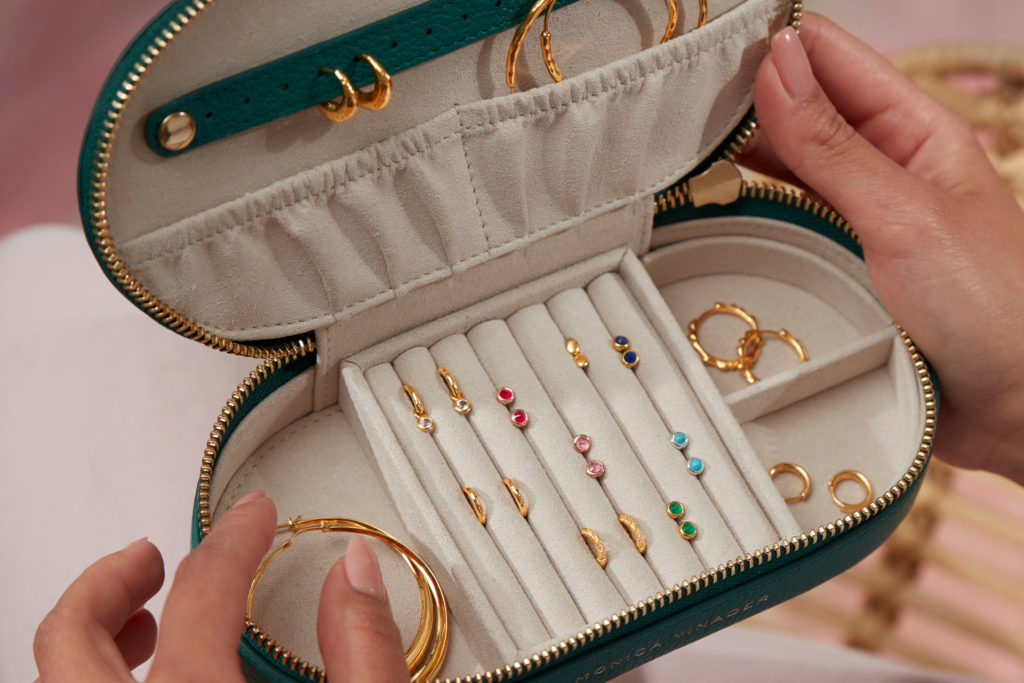 Close up of hands on jewellery box