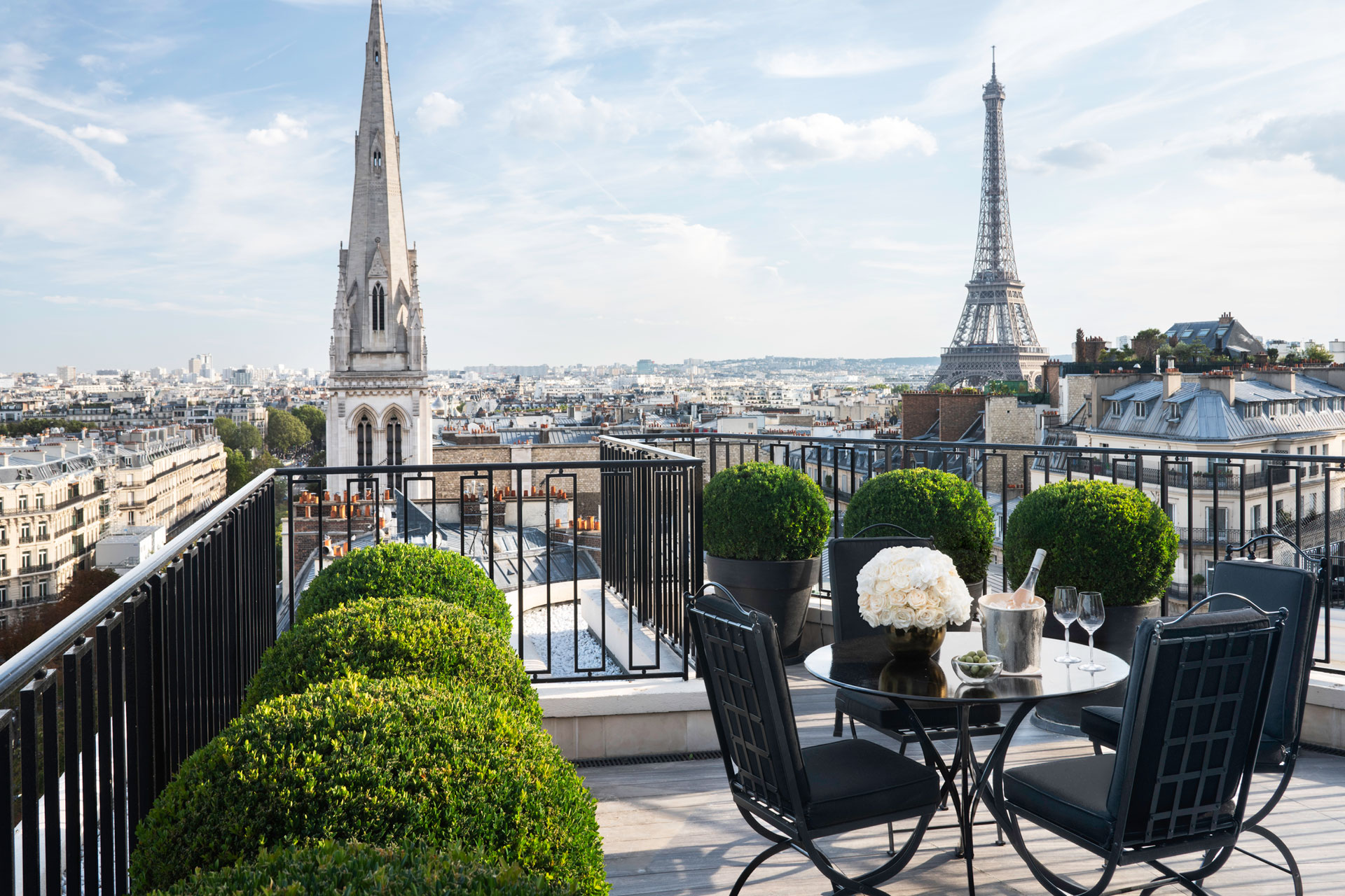 A balcony overlooking the Eiffel Tower at Four Seasons Hotel George V, Paris