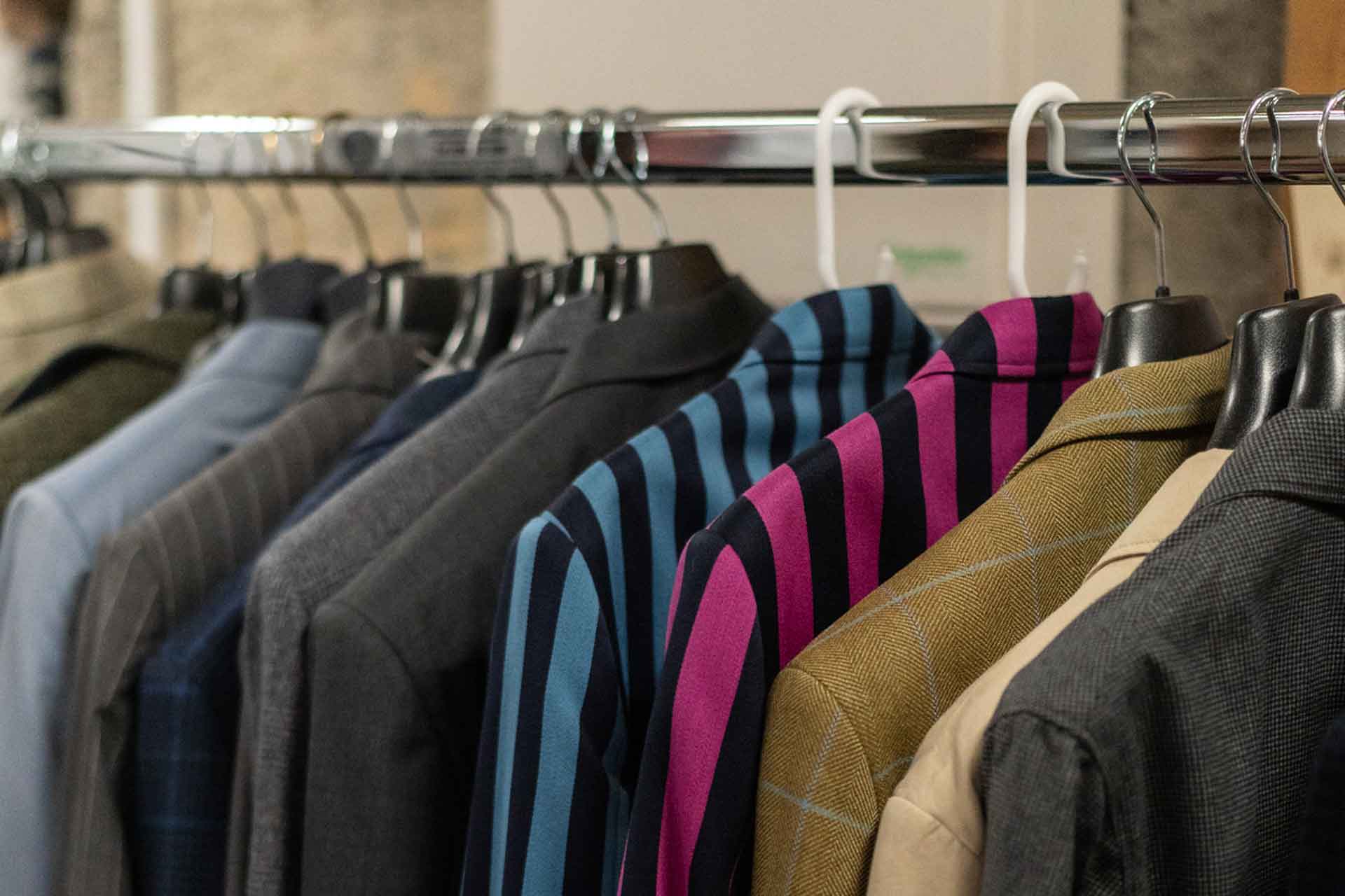 Suits hanging on a rack
