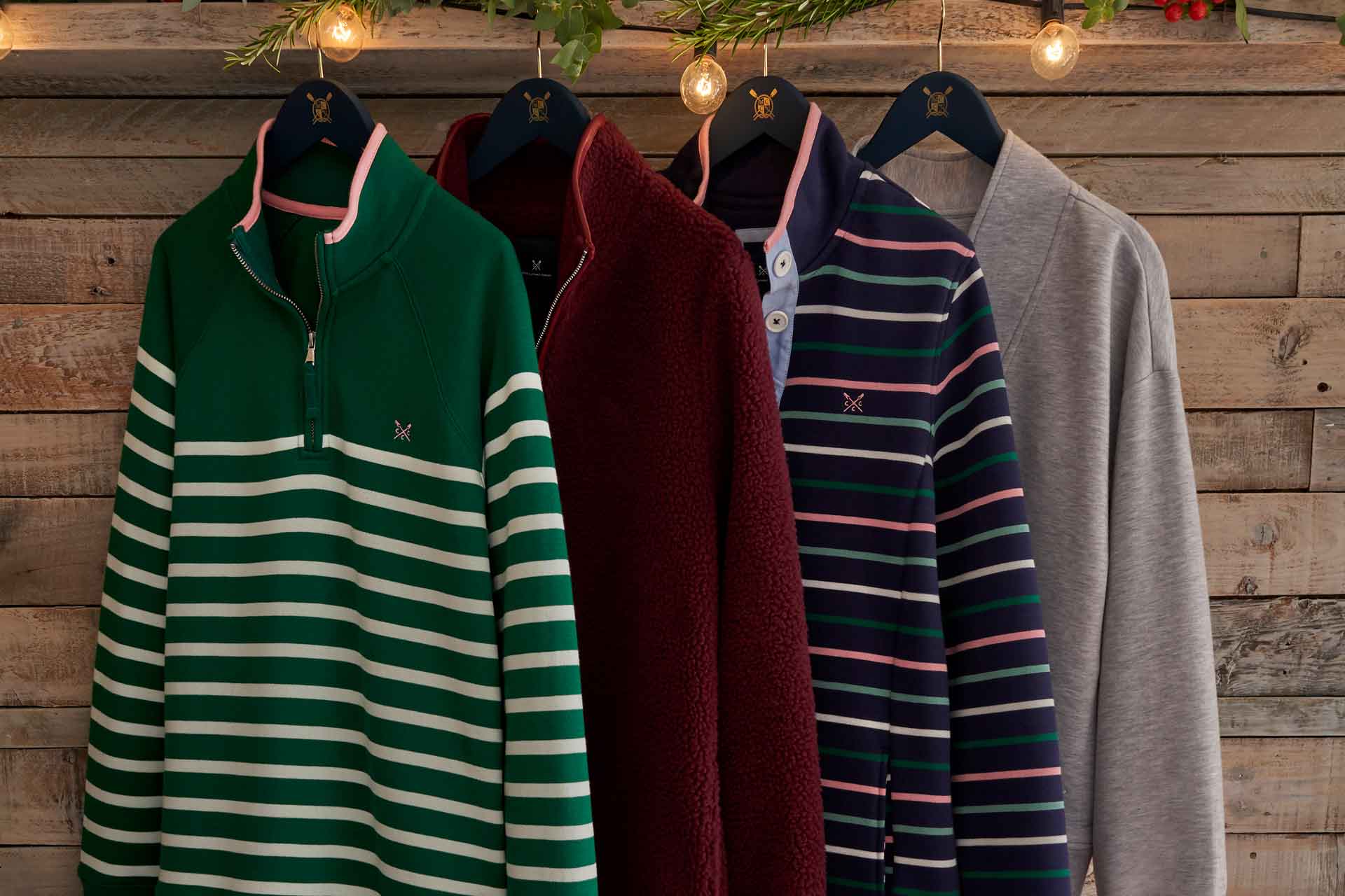 Stripey Crew Clothing fleeces hanging on a rack