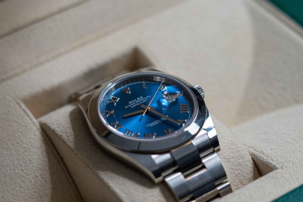 Rolex watch with blue dial