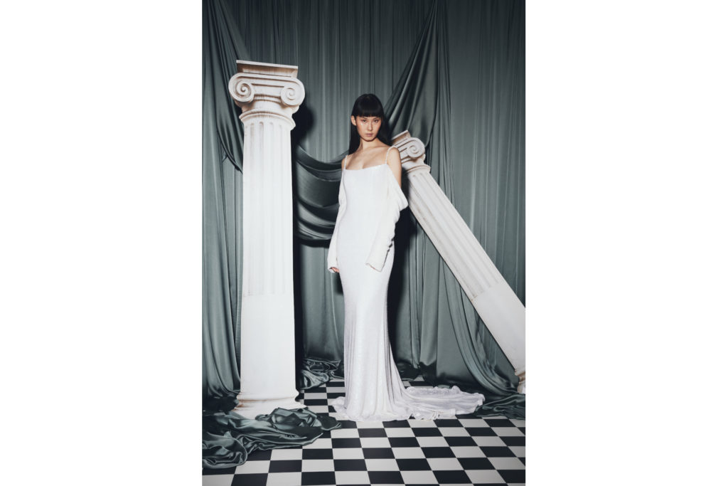 Woman in long sleeve dress | winter wedding dresses