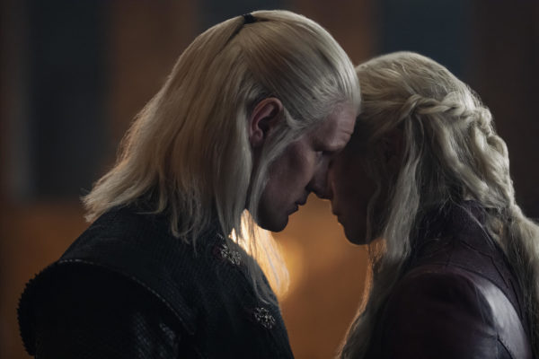 Two people with heads close together