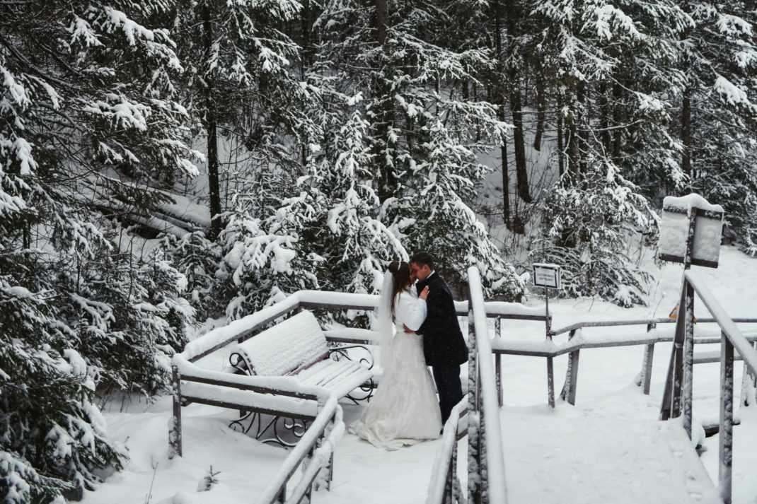 Bride and groom in snow