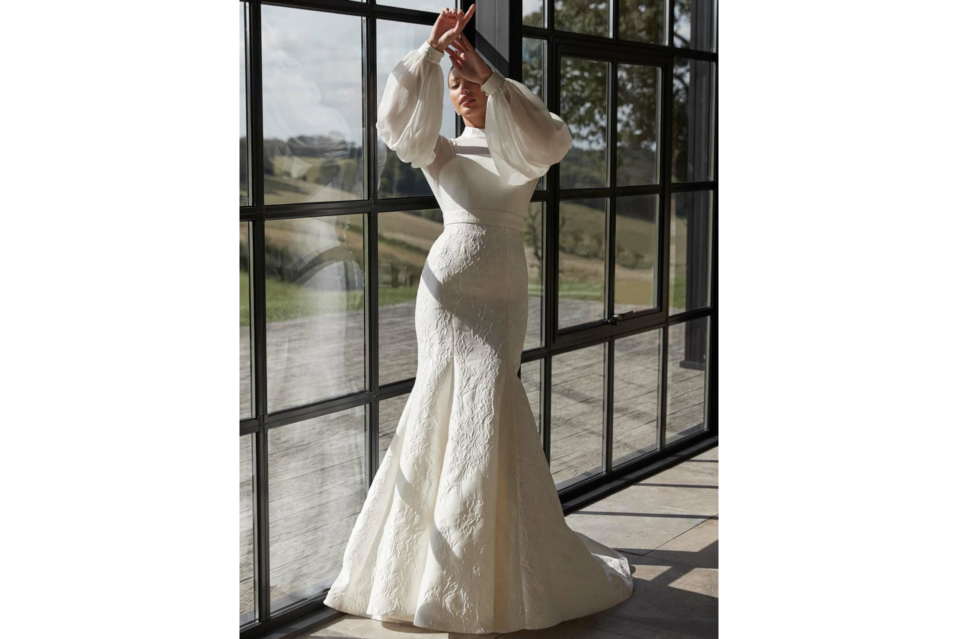 Woman in long sleeve dress | winter wedding dresses