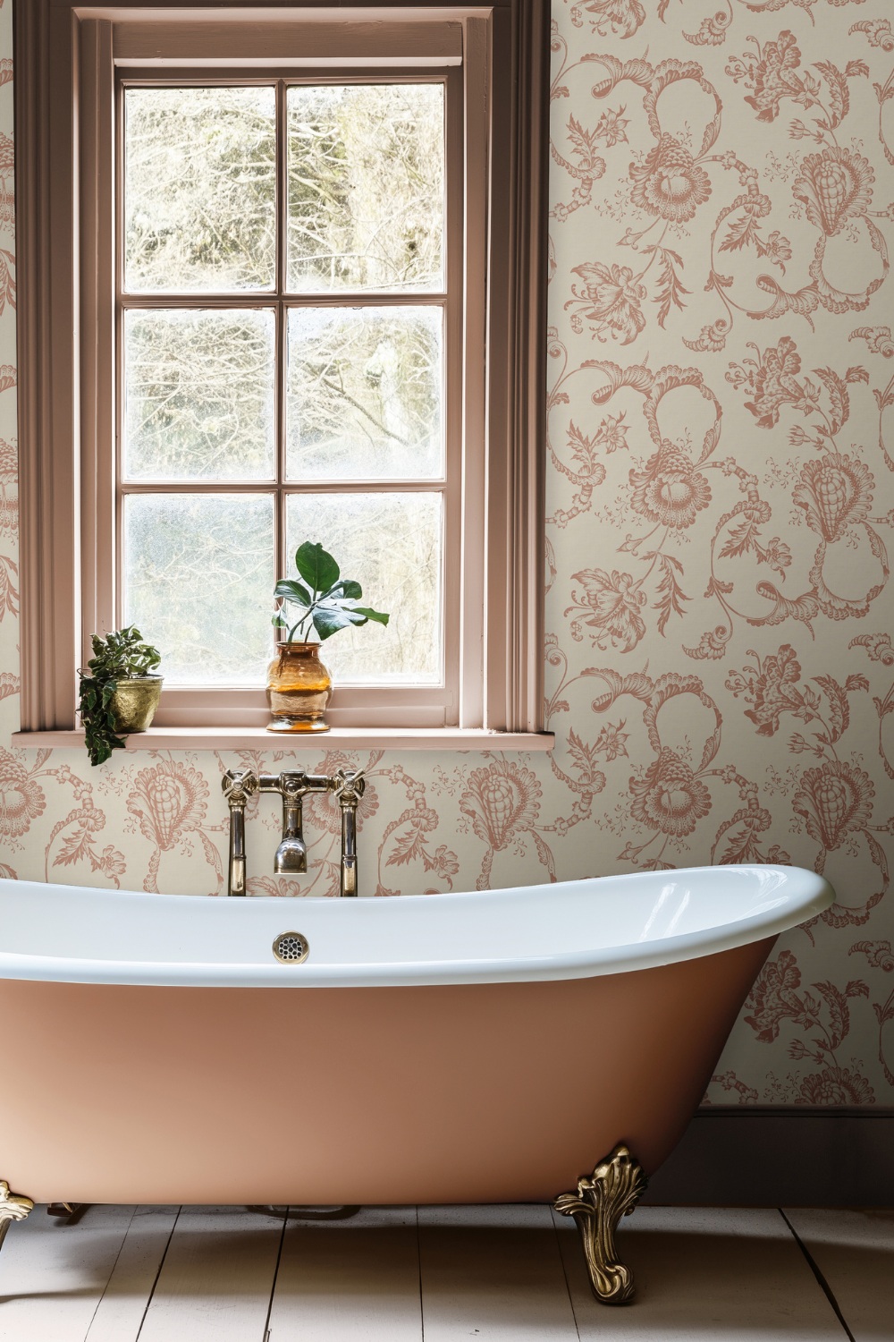 Bathtub with wallpapered walls
