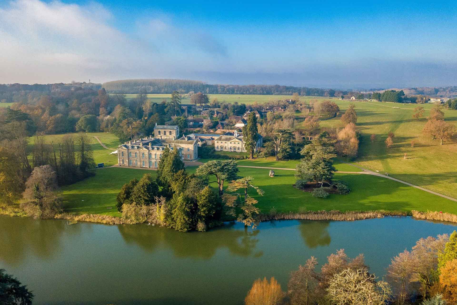 Aerial view of Compton Verney estate, with grounds and a lake.