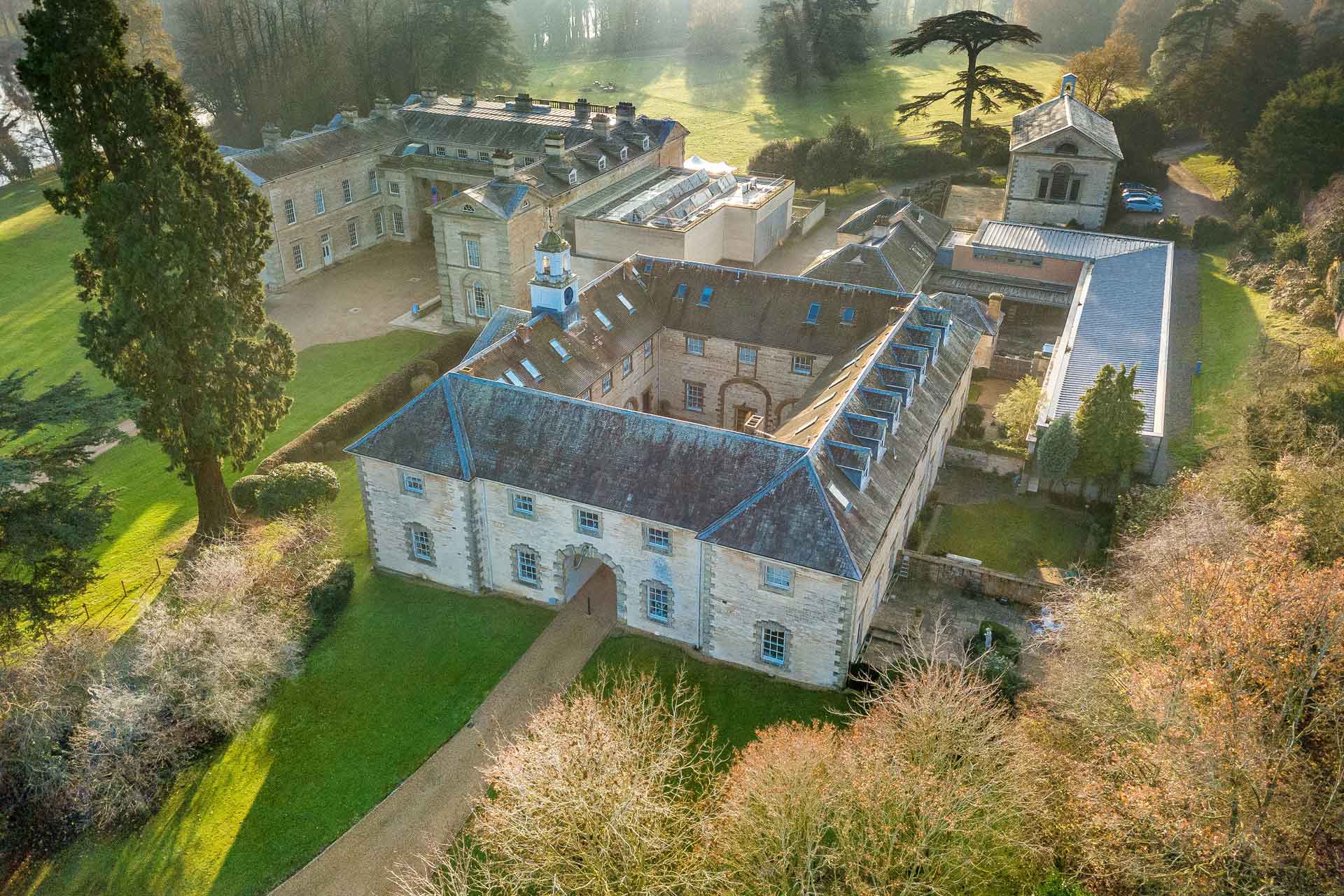 Aerial view of 1 The Coach House at Compton Verney: a square building with a central courtyard.