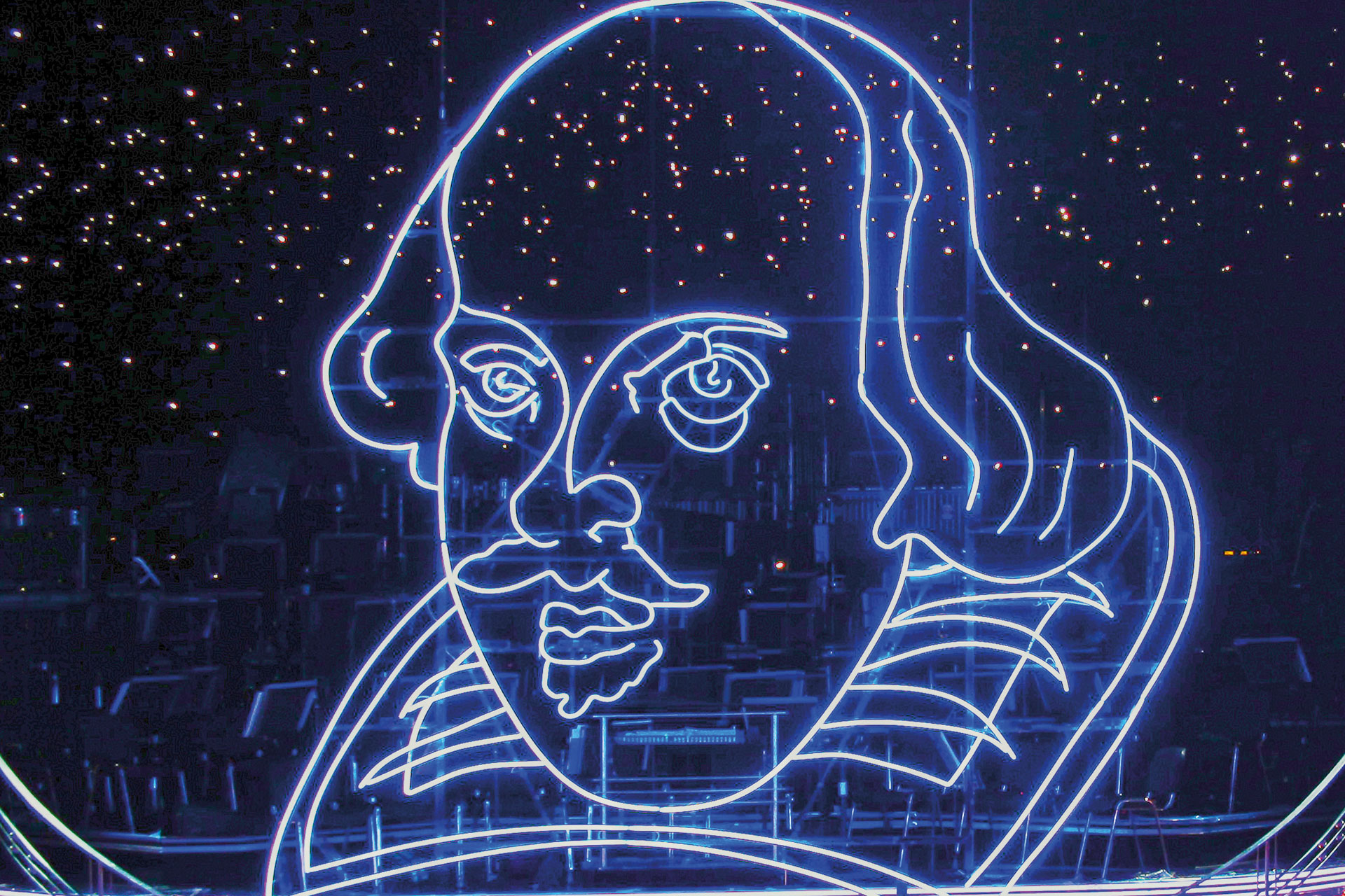 A neon head of Shakespeare