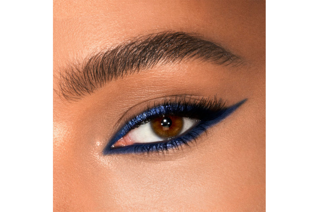 Close up of woman's eye with knight blue makeup