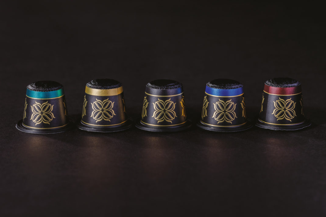 Coffee pods on dark background