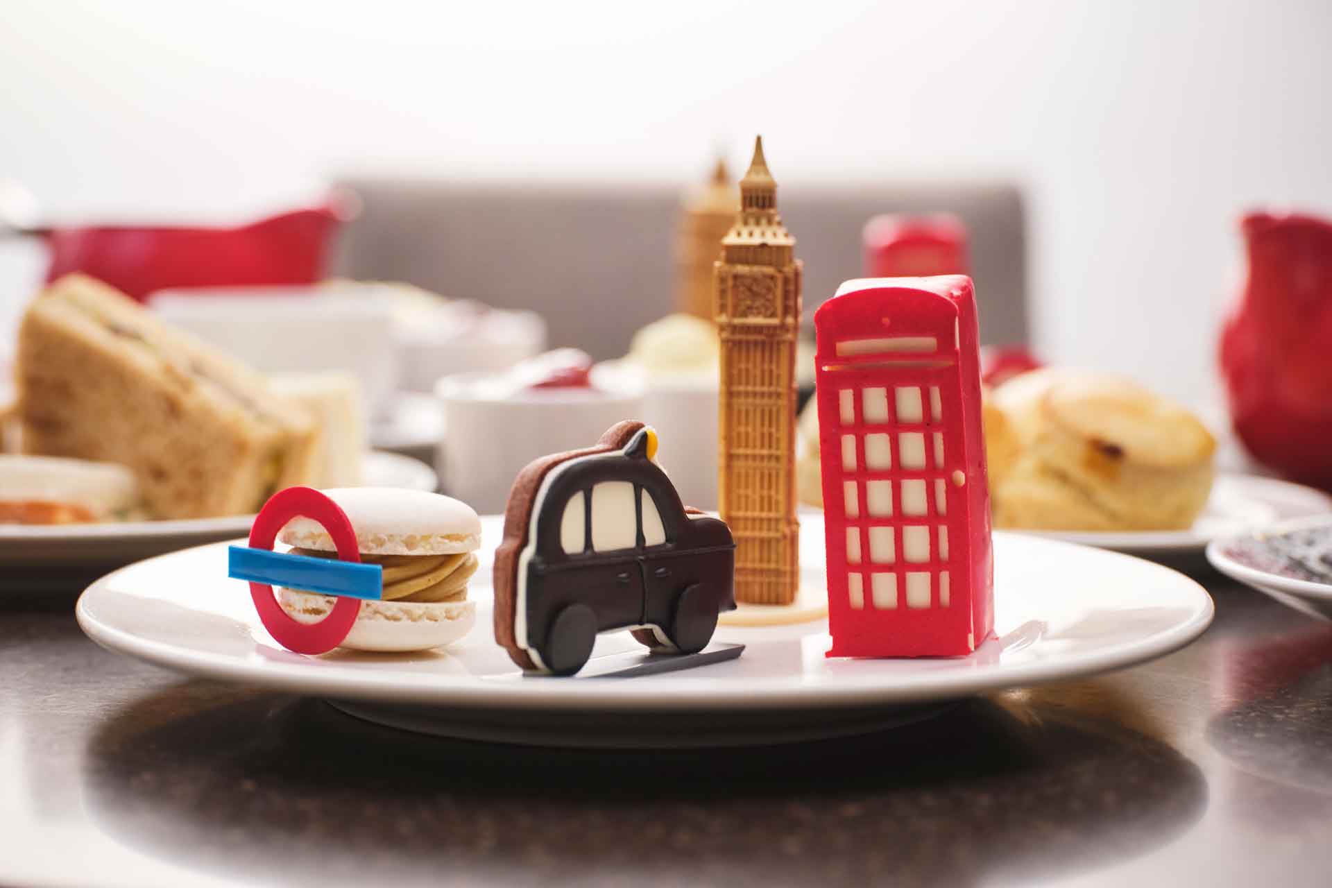 Plate of cakes shaped like a London taxi, a phone box and Big Ben