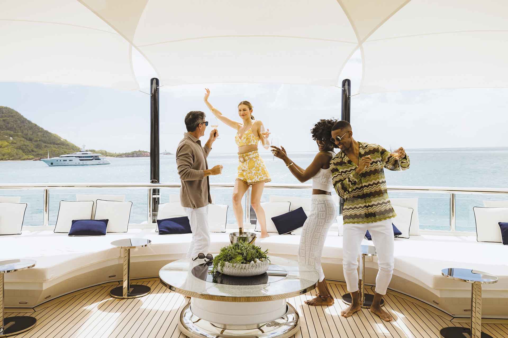 People partying on the top deck of a yacht
