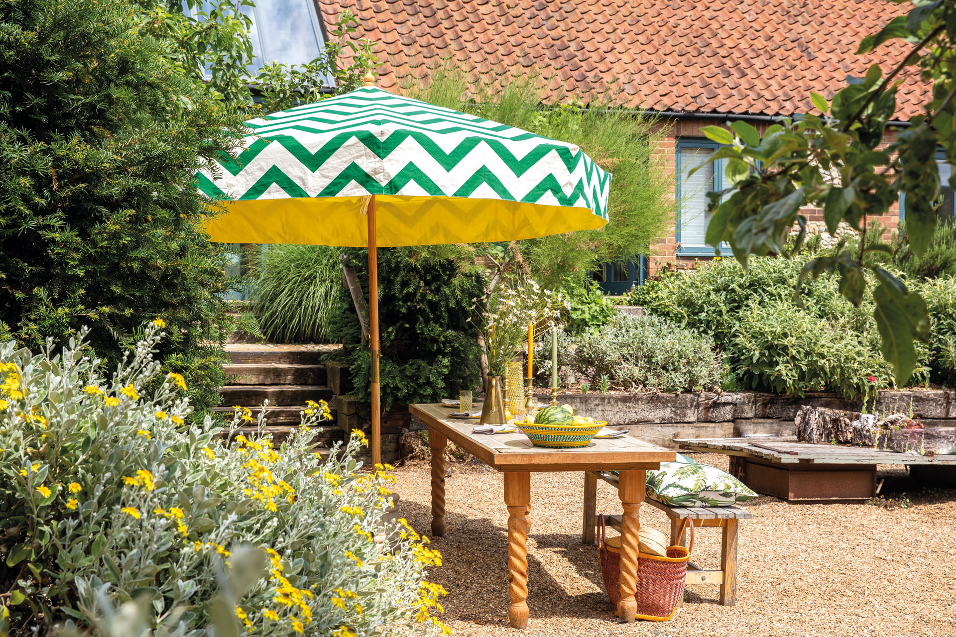 East London Parasol Company green zig zag umbrella in garden